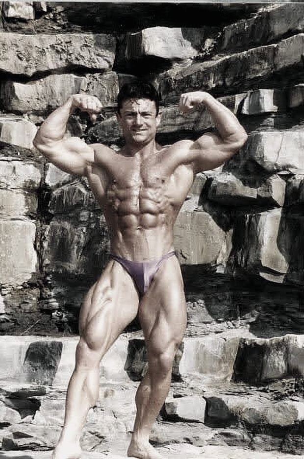 Tony Barnbrook competing in the early 1990s, front double biceps pose
